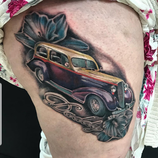 Explore tramp stamp lower back tattoo cover up ideas, creative tattoo ideas in Abington, available at Ink Boss Tattoo & Piercing Studio