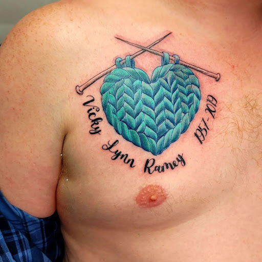 Explore black mens tattoo ideas, creative tattoo ideas in Marietta, available at Monkeys Uncle Tattoo