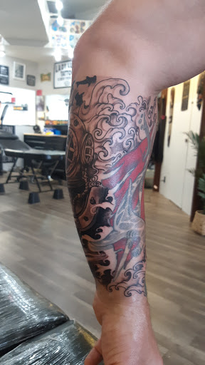 Explore broken heart tattoo ideas for guys, creative tattoo ideas in Kailua Kona, available at Lady Luck Tattoo & Body Piercing