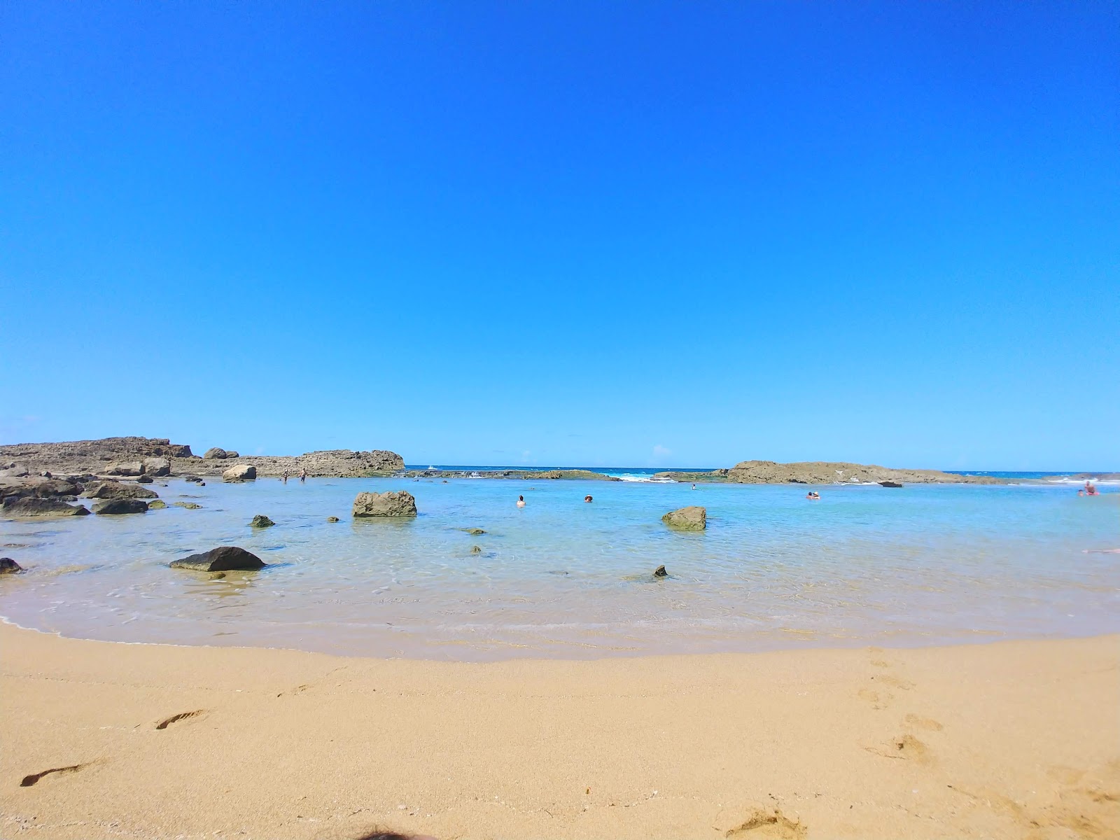 Photo of Pozo Teodoro with turquoise pure water surface