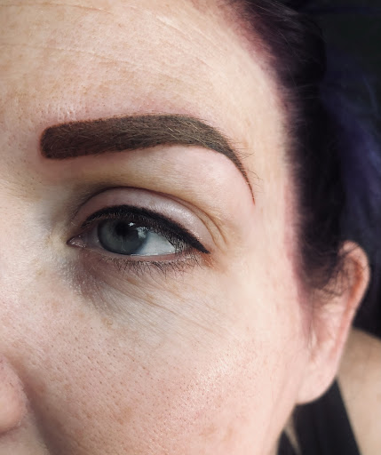 Explore spiral tattoo ideas, creative tattoo ideas in North Tonawanda, available at Dark Side Ink Tattoo Studio