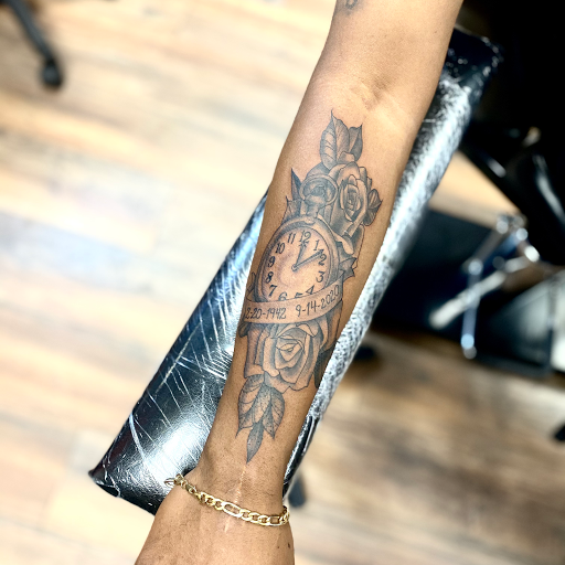 Explore concert tattoo ideas, creative tattoo ideas in Jacksonville, available at Tattoo Freddies House of Ink