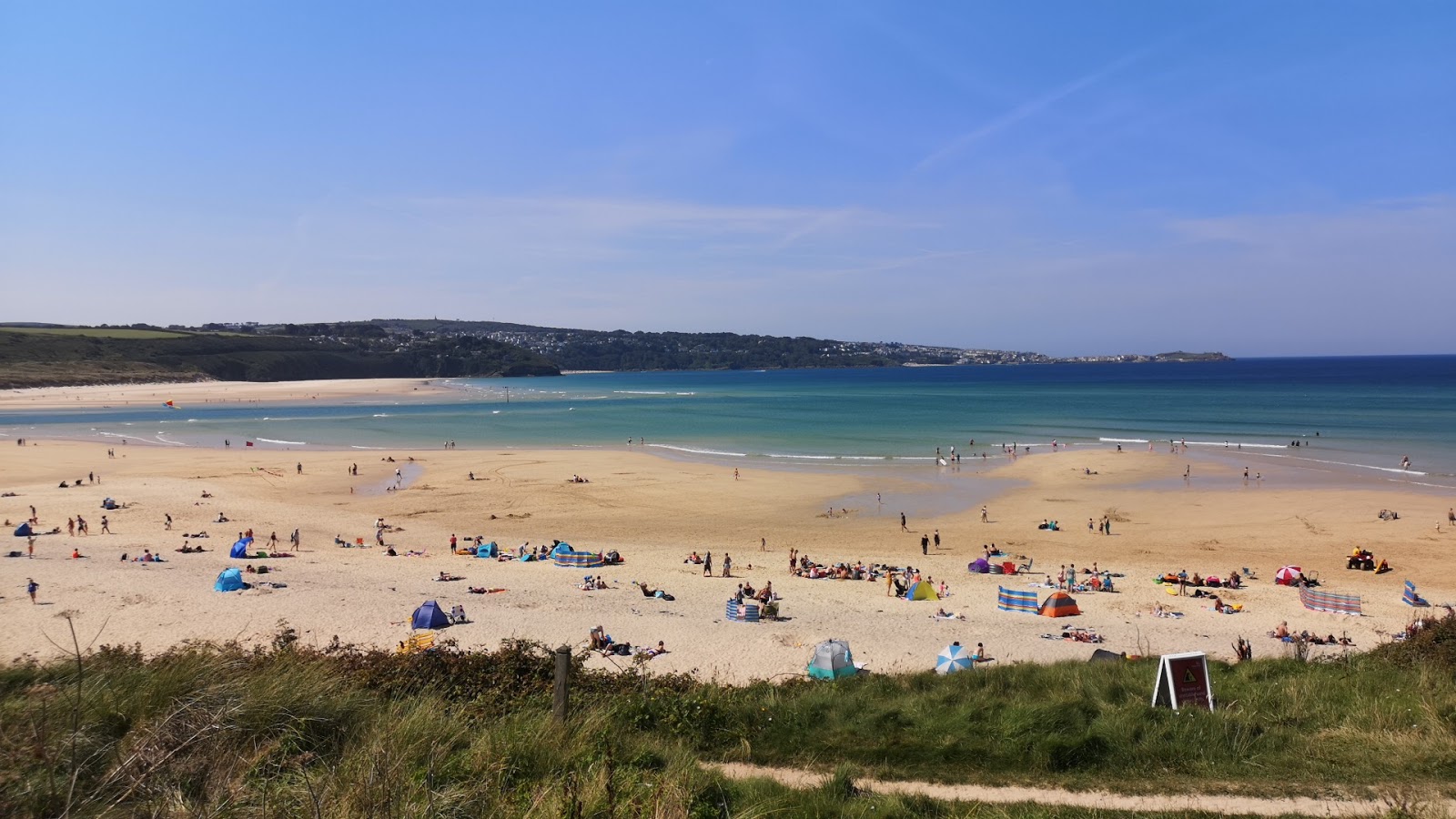 Photo of Hayle Beach with turquoise pure water surface