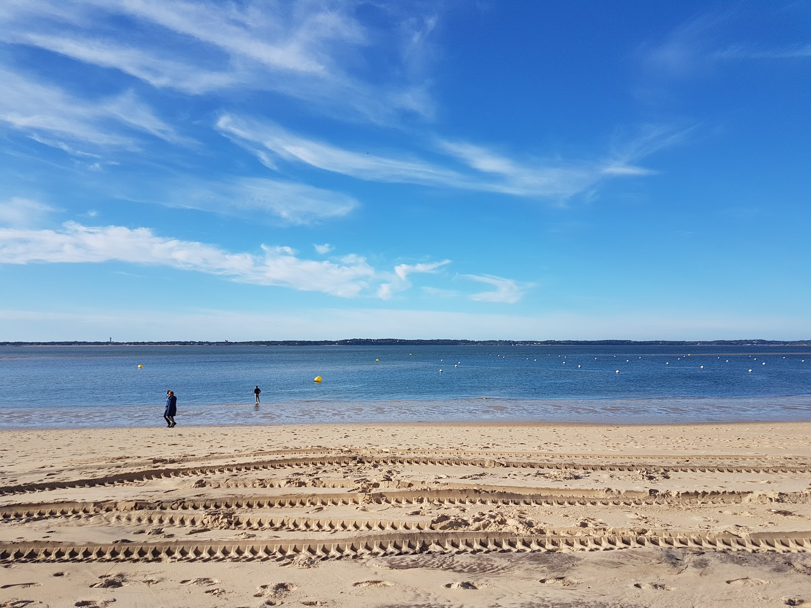 Foto di Spiaggia di Pereire con costa lunga e dritta