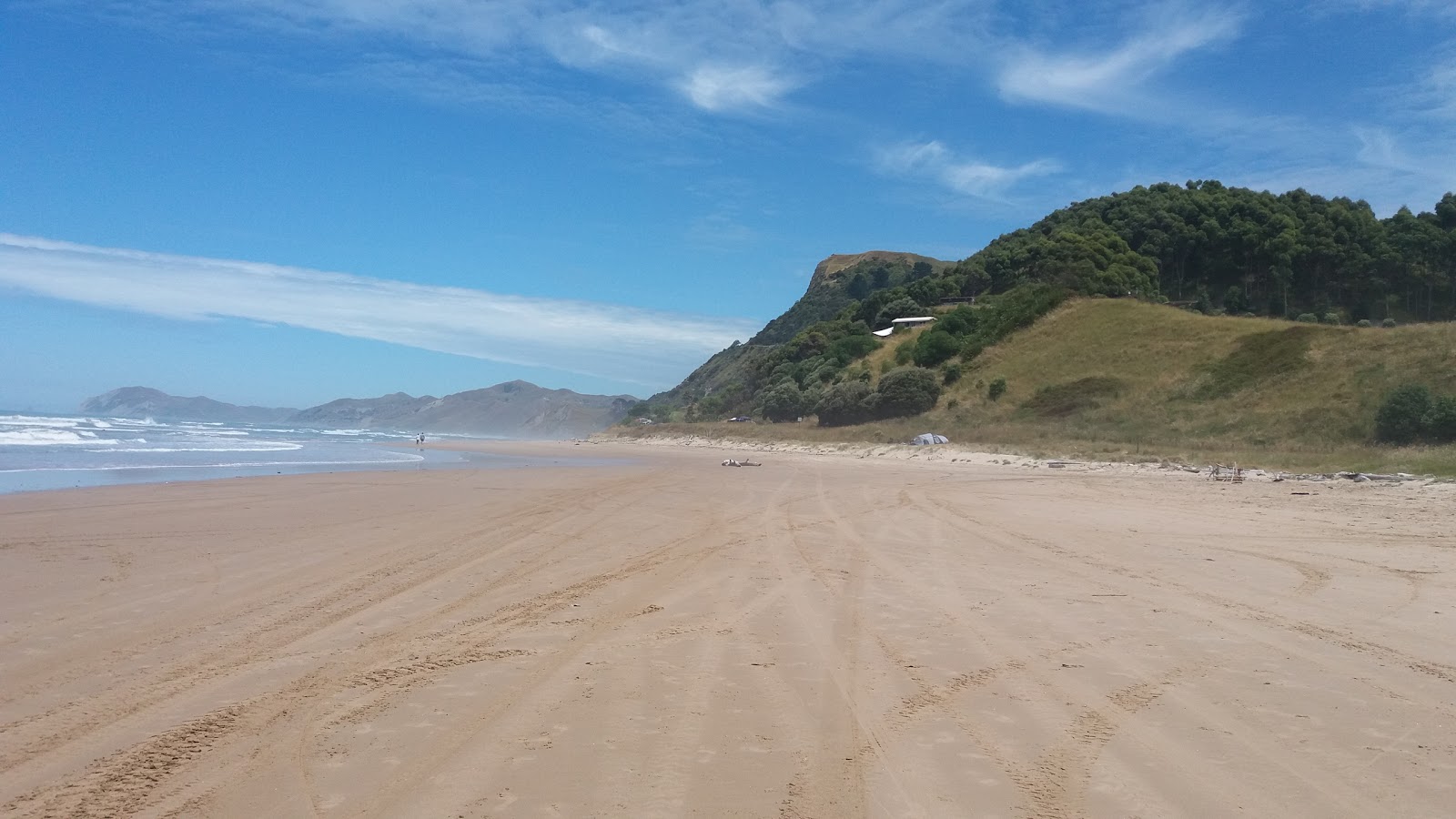 Foto van Waihau Bay Beach met recht en lang