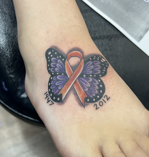 Explore lab tattoo ideas, creative tattoo ideas in Whiteville, available at Coup de Gras 2.0 Tattoo and Body Piercing