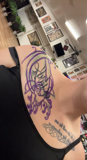 Explore bookish tattoo ideas, creative tattoo ideas in Marysville, available at Elegant Arts Tattoo Parlor