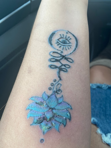 Explore pain tattoo ideas, creative tattoo ideas in Hampton, available at Blue Horseshoe Tattoo and Body Piercing