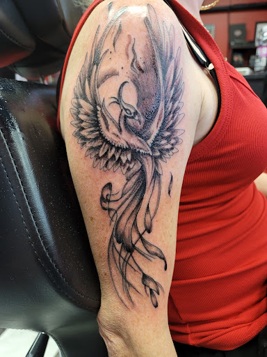 Explore geometric sleeve tattoo ideas, creative tattoo ideas in Milford, available at Boston John Tattoos