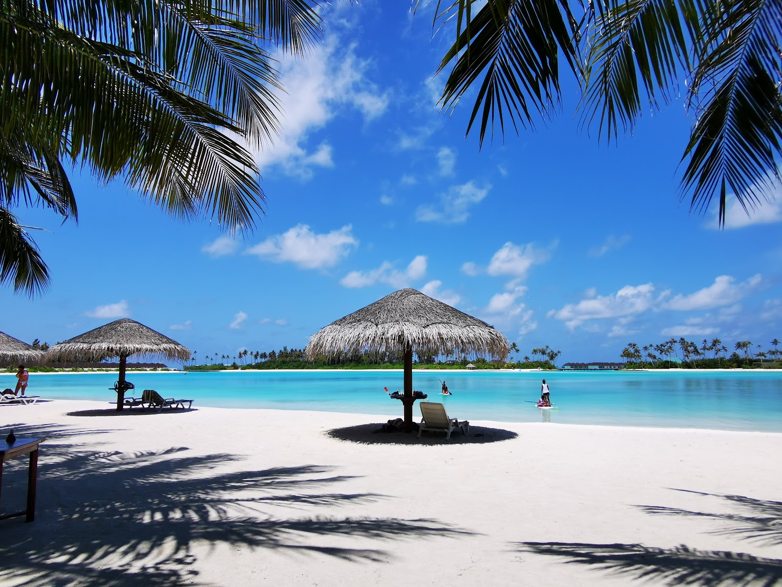 Foto von Sun Siyam Olhuveli Strand mit feiner weißer sand Oberfläche
