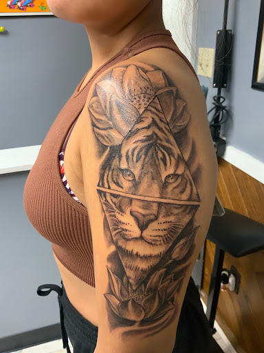 Explore tattoo cover ups ideas, creative tattoo ideas in Des Moines, available at Skin Kitchen Tattoo