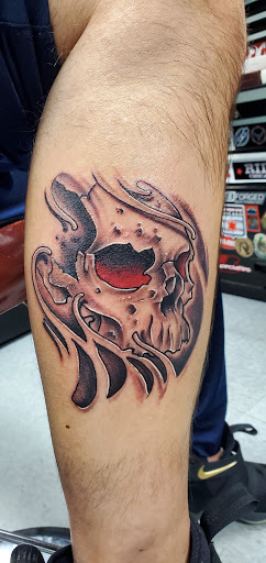 Find skull tattoo ideas for females for your next unique tattoo in Chicago at THE TAT CAVE