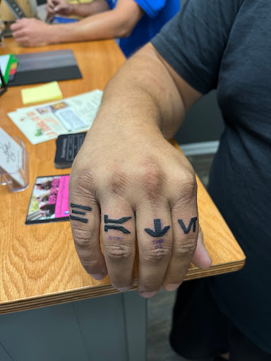 Explore family over everything tattoo ideas, creative tattoo ideas in Lexington, available at Ink Addiction Tattoos, LLC