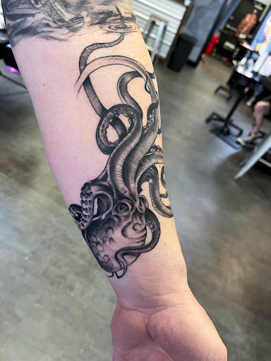 Explore parrot tattoo ideas, creative tattoo ideas in Navarre, available at Eleven 11 Tattoo Studio