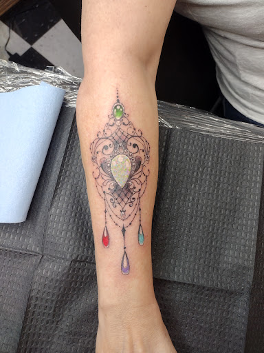 Explore motorcycle tattoo ideas, creative tattoo ideas in Fort Morgan, available at InkD Out Tattoo & Piercing