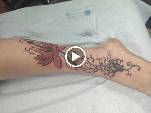 Explore postage stamp tattoo ideas, creative tattoo ideas in Santa Rosa, available at Faith Tattoo