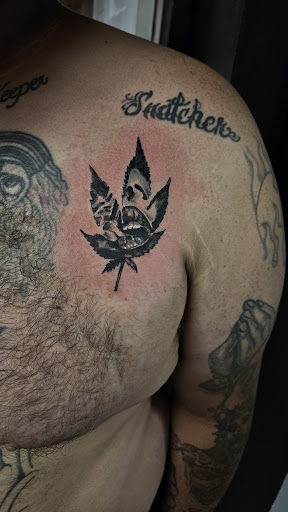 Explore dragon tattoo cover up ideas, creative tattoo ideas in Cumberland, available at Queen City Ink