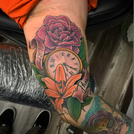 Find tattoo ideas with trees for your next unique tattoo in Altoona at Electric Wave Tattoo