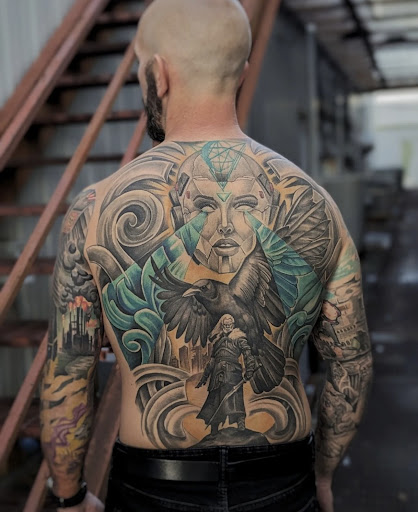 Explore chest tattoo ideas woman, creative tattoo ideas in Dothan, available at Dinosaur Tattoo Company