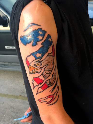 Explore knee surgery tattoo ideas, creative tattoo ideas in Okeechobee, available at Muck City Tattoos & Piercings