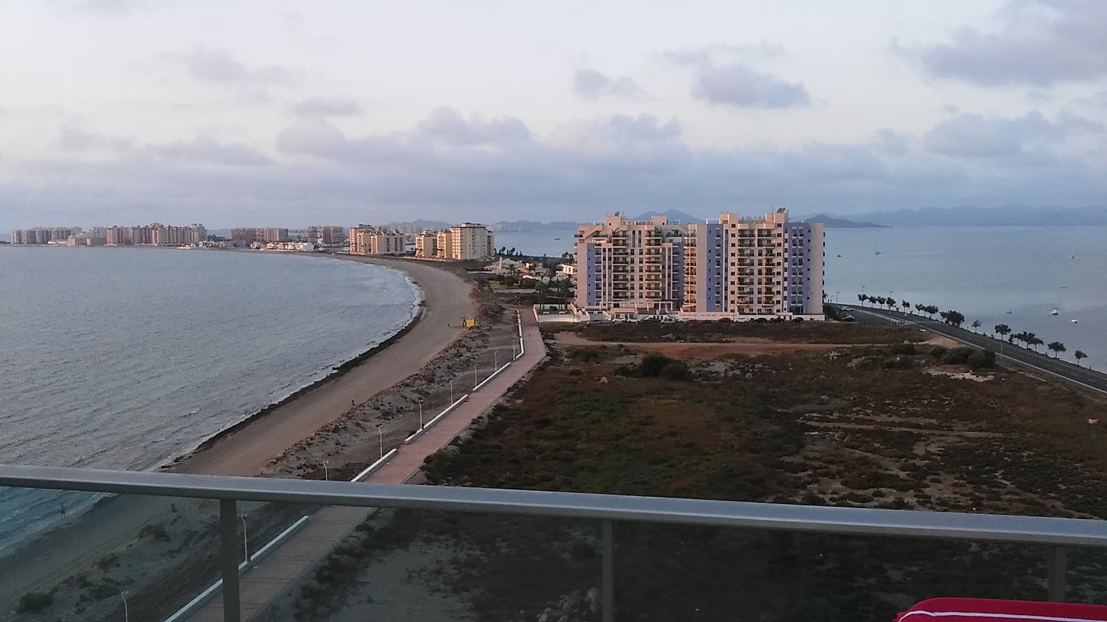 Foto av Playa del Pudrimel och bosättningen