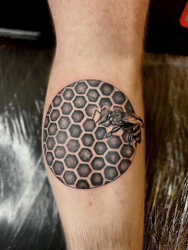 Explore flower leg tattoo ideas, creative tattoo ideas in Vancouver, available at New Ink Tattoo