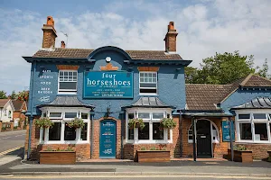 Four Horseshoes image