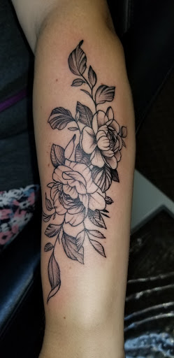 Explore tattoo ideas tribal arm, creative tattoo ideas in Angola, available at Hoodlum Ink