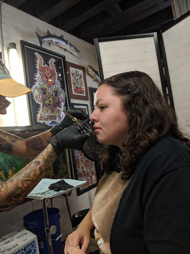 Explore cool arm tattoo ideas for guys, creative tattoo ideas in Newburgh, available at Millennium Tattoo