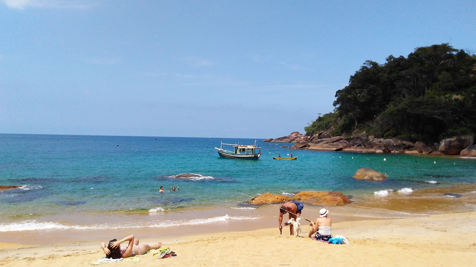 Foto av Praia de Ponta Negra med turkos rent vatten yta