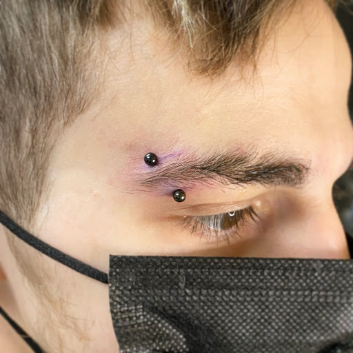 Explore firefighter sleeve tattoo ideas, creative tattoo ideas in Louisburg, available at Purple Dot Piercings