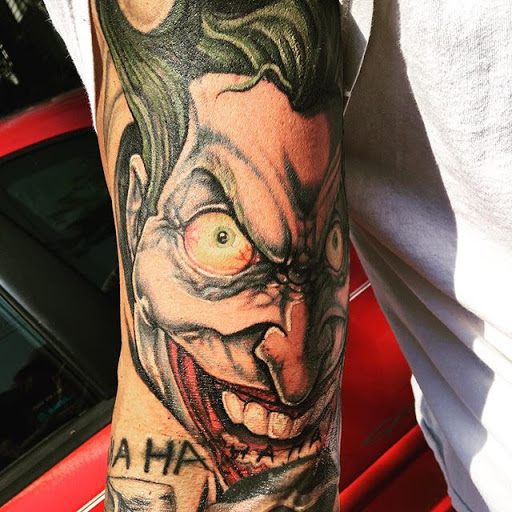 Explore skull and rose tattoo ideas, creative tattoo ideas in Cleveland, available at Tattoo Cafe