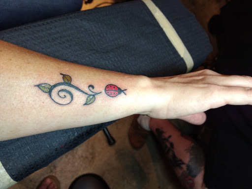 Explore child birth date tattoo ideas for guys, creative tattoo ideas in Franklin, available at Battleground Tattoo Parlour