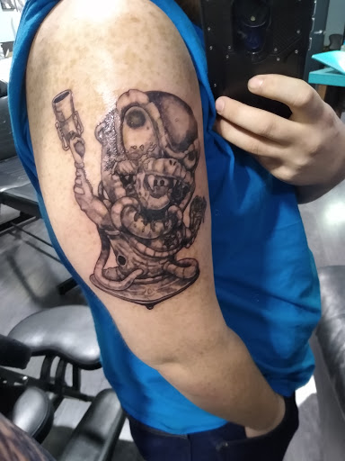 Explore stomach tattoo ideas for men, creative tattoo ideas in Indianapolis, available at Speakeasy Tattoo Studio