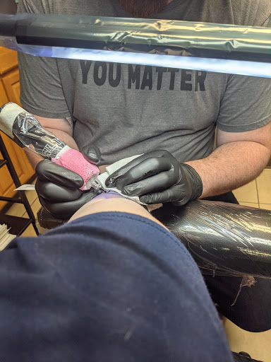Explore haunted mansion tattoo ideas, creative tattoo ideas in Lawrence, available at Skin Illustrations Tattoos & Piercings