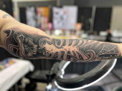 Explore concert tattoo ideas, creative tattoo ideas in Smithville, available at Sanctioned Arts Tattoo Co.