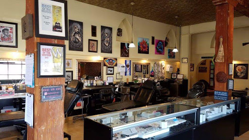 Explore chain tattoo ideas, creative tattoo ideas in Venice, available at Ink Monkey Tattoo and Piercing