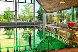 Indoor swimming pool in the center image