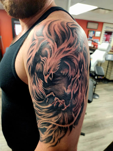 Explore lower half sleeve tattoo ideas for females, creative tattoo ideas in West Bend, available at Frenchys Tattoos & Co LLC