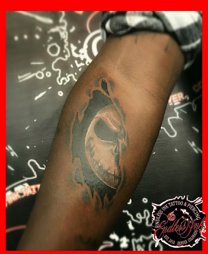 Explore arch angel tattoo ideas, creative tattoo ideas in Denver, available at Endless Ink Tattoo & Piercing