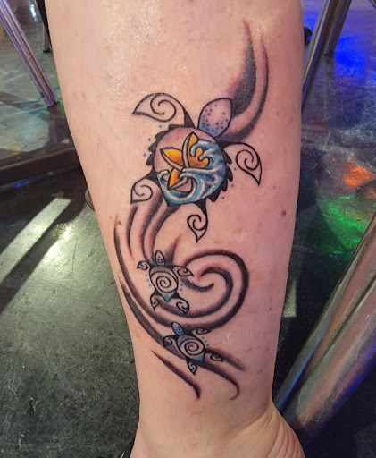 Explore tattoo ideas for name cover up, creative tattoo ideas in Panama City Beach, available at Revolution Tattoo & Body Piercing
