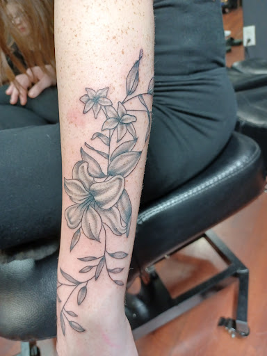 Explore family names tattoo ideas for guys, creative tattoo ideas in Shippensburg, available at LAZY WIZARD TATTOOS