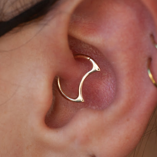 Explore cute flower tattoo ideas, creative tattoo ideas in Boston, available at Arcadia Body Piercing