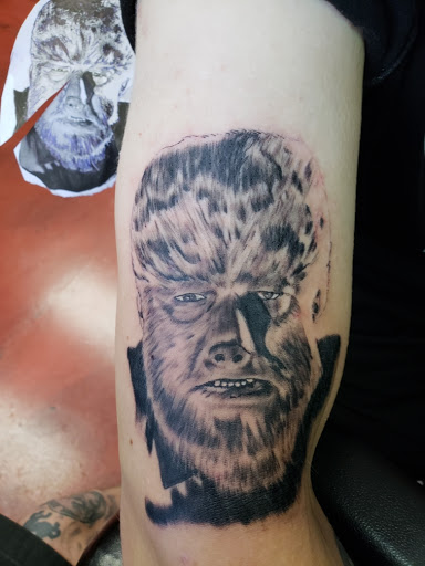 Explore background ideas for sleeve tattoos, creative tattoo ideas in Cincinnati, available at Bullseye Ink Tattoos & Piercing