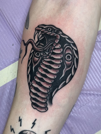 Explore small black tattoo ideas, creative tattoo ideas in Derwood, available at Tattoo Paradise