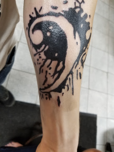 Explore boxer dog tattoo ideas, creative tattoo ideas in Lebanon, available at Chucks Tattooing & Body