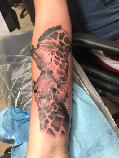 Explore background filler tattoo ideas, creative tattoo ideas in Alamogordo, available at The Poison Frog Tattoo Studio