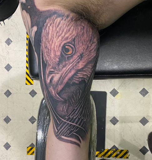 Explore shark tooth tattoo ideas, creative tattoo ideas in Evansville, available at Ink Therapy 101