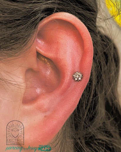 Find tummy tuck tattoo ideas for your next unique tattoo in Saint Paul at Electric Strawberry Piercing