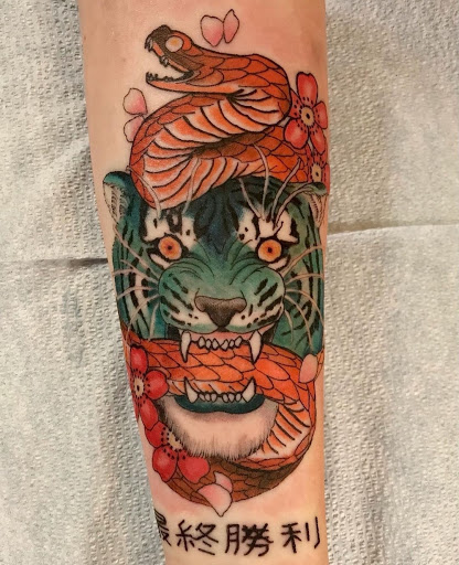 Explore cool hand tattoo ideas for guys, creative tattoo ideas in Spokane, available at Feel Good Ink